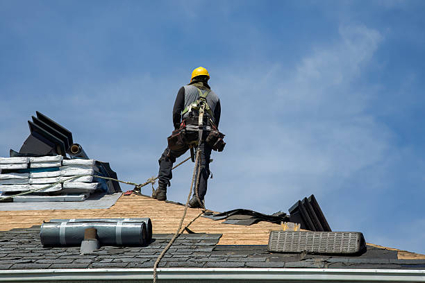 Professional Roofing technician working in Danville, IA